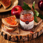 Jar of wild crabapple and sweet clover jelly with toast