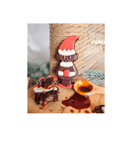 Figurine en chocolat de Noël sur planche en bois